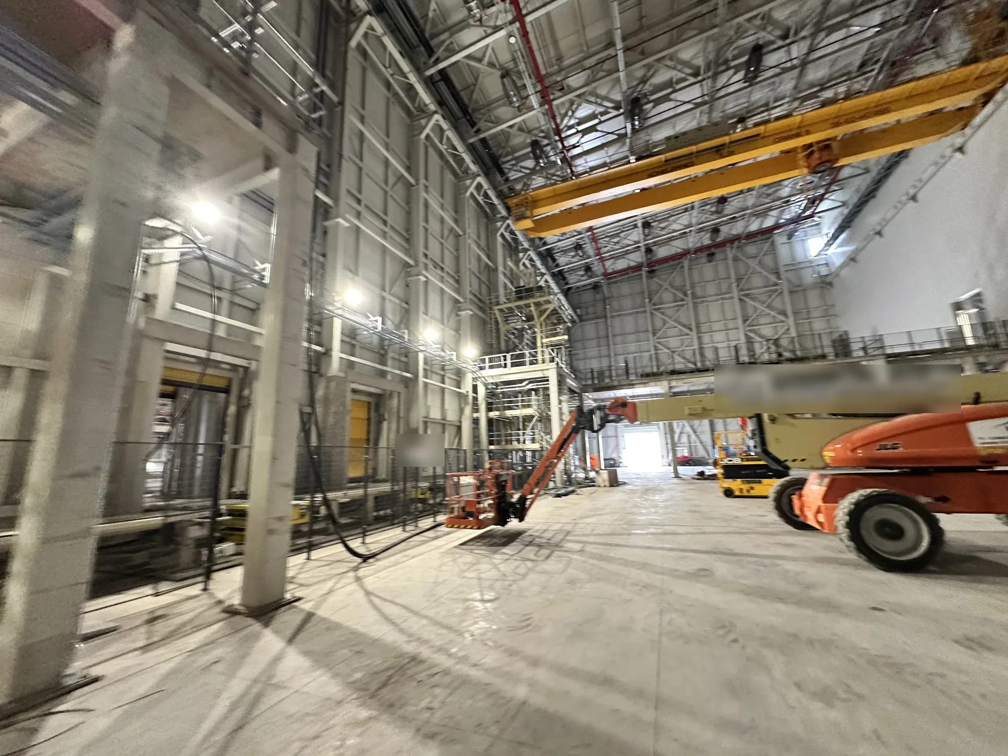 High-bay lighting inside a large industrial building