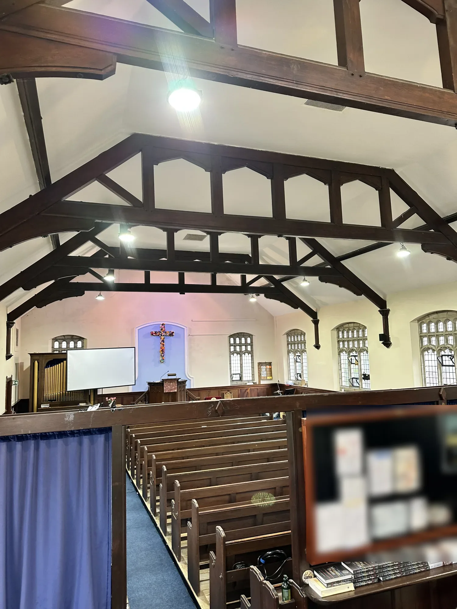 Church interior from the back showing the new ceiling lighting